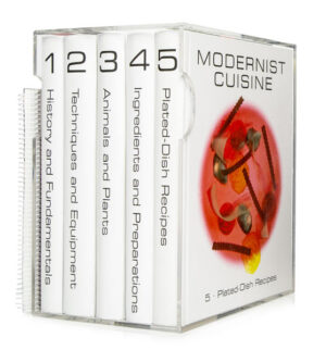 Acrylic case, five hardcover books, each with a ribbon marker, plus a durable, spiral-bound, waterproof kitchen manual. Just as French Impressionists upended centuries of tradition, Modernist cuisine has in recent years blown through the boundaries of the culinary arts. Borrowing techniques from the laboratory, pioneering chefs at world-renowned restaurants such as elBulli, The Fat Duck, Alinea, and wd~50 have incorporated a deeper understanding of science and technology into their culinary art. Nathan Myhrvold and his 20-person team at The Cooking Lab have achieved astounding new flavors and textures by using tools such as water baths, homogenizers, and centrifuges, and ingredients such as hydrocolloids, emulsifiers, and enzymes. The team has created a series of reference titles that reveal science-inspired techniques for preparing and photographing food that ranges from the otherworldly to the sublime. Modernist Cuisine: The Art and Science of Cooking, Modernist Cuisine at Home, and The Photography of Modernist Cuisine are works destined to reinvent cooking.