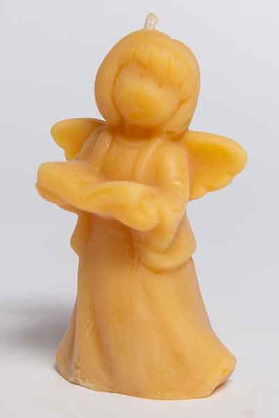 Honighäuschen - Die Bienenwachsfigur "Lesender Engel mit Buch", eine Kerze aus 100 % reinem Bienenwachs, wurde gefertigt in der Bioland Imkerei Dühnen.